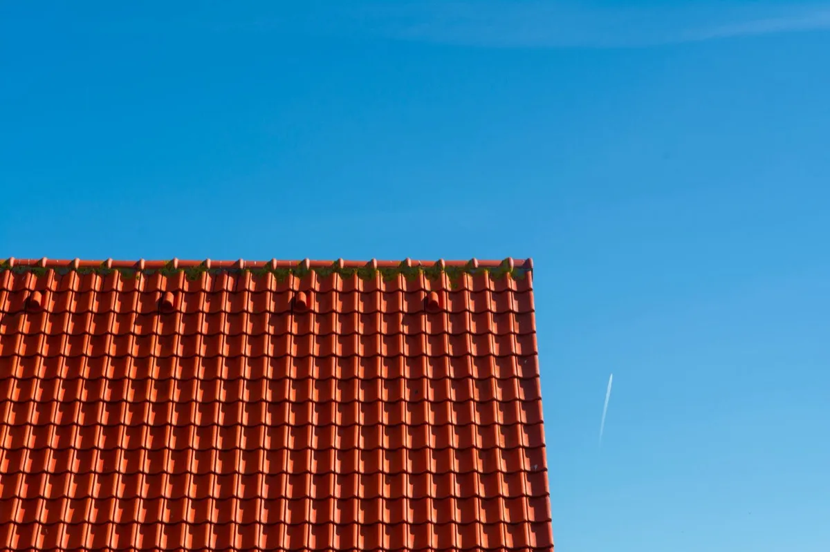 Tile roof gable in full sun, the kind of exposure that sets roof life in Stephenville, TX